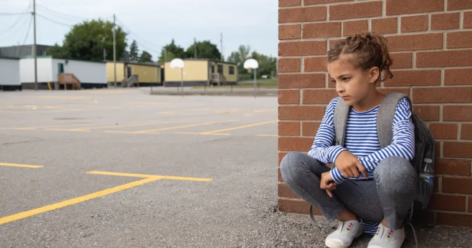 Kindergarten child isolating herself